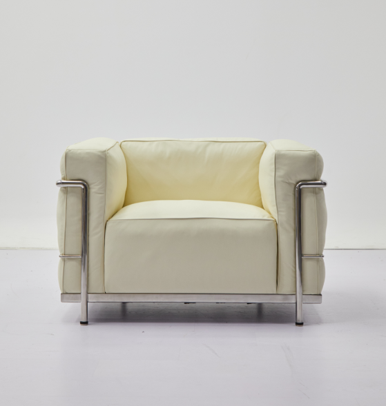 The Corbusier group referred to their Sofa Collections (1928) as "cushion baskets", which they designed as a modernist response to the traditional club chair. These pieces reverse the standard structures of sofas and chairs by having frames that are externalized. With thick, resilient pillows resting within the steel frames, the idea was to offer all the comfort of a padded surface while applying the elegant minimalism and industrial rationale of the International Style. The resulting aesthetic of the Corbusier Grand Modele Armchair's simple tubular structure is remarkably relevant to how we live today, almost 90 years later.